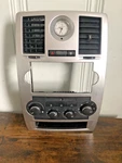 2005-2007 Chrysler 300C Radio Dash Bezel Vent Trim + Climate Control Ac Oem. Fixed Price $69.70.