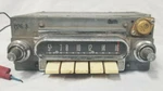 Vintage Ford Radio 14ME 43119. Fixed Price $65.00.