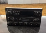 Ford Cassette Player Radio W/ Clock 99-2004 3C2T-19B132-AC. Fixed Price $79.99.