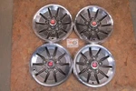 1974, 75, 76 Ford Torino, Mercury MONTEG0 14" Wheel Covers, Hubcaps, Set Of. Fixed Price $99.95.