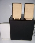 Set 4 Used Nht Surround Sound Speakers Including Subwoofer. Fixed Price $399.99.