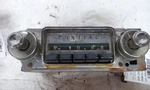 1963 Pontiac Tempest Radio. Fixed Price $144.12.