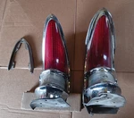 56 57 Packard Clipper Tail Lights Bezels Lenses Housings Quarter Panel Cutoff. Fixed Price $895.00.