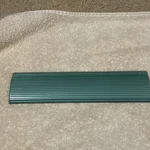 Ford FDR-7004371-AW 1956-57 Fairlane Victoria Green Dash Radio Delete Plate. Fixed Price $28.00.