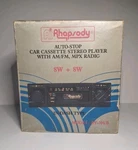Vintage Nos Rhapsody Auto-stop Car Cassete Stereo Player Am/ Fm Radio RY-705/B. Fixed Price $130.00.