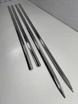 (4) Nos 1957 Chevrolet Belair 210 Dr & Convertible Door And Fender Moldings O8. Fixed Price $459.95.